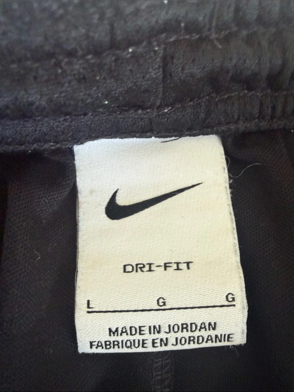 Nike Black Kids Athletic Shorts with White Logo Outline